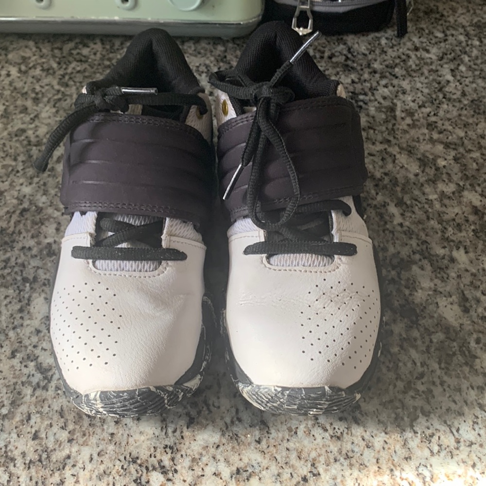 Under Armour size 2 basketball shoes black/white